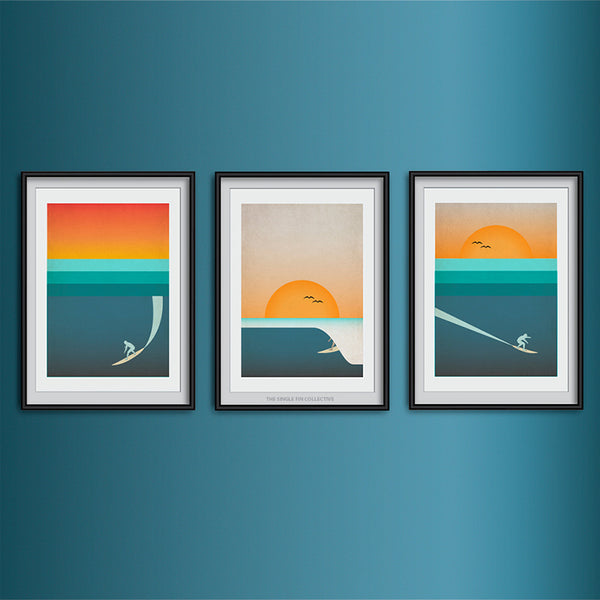 3 art prints show with bright rainbow colours and surfers on a wave